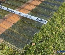 Polykarbonátová deska trapézová 76/18, 0,8mm, kouřová, 1265mm x na míru, 1x UV ochrana - DECOPOL ELYSOL